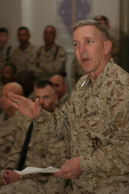 Major Gen. Richard A. Huck, 2d Marine Division commanding general, speaks to his officers and enlisted personnel during the Transfer of Authority ceremony with Maj. Gen. Richard F. Natonski, 1st Marine Division commanding general, March 17.  Natonski relinquished authority of operations in the Al Anbar Province to Huck during the ceremony.  U.S. Marine Corps photo by Sgt. Stephen D'Alessio (RELEASED)