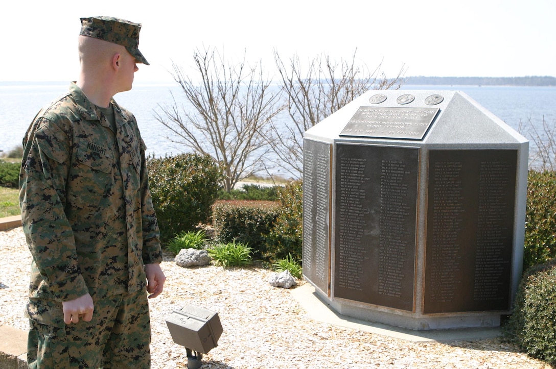 MARINE CORPS BASE CAMP LEJEUNE, N.C. (March 30, 2006)- Pfc. Daniel M. Knight, 19, from Simpsonville, S.C., looks at names on the Beirut Memorial here. Knight, a 2005 Woodmont High School graduate, is preparing to deploy to Iraq for the first time. His father, Morris, is a Vietnam veteran and explained that he is extremely proud of his son. (Official U.S. Marine Corps photo by Lance Cpl. Lucian Friel (RELEASED)