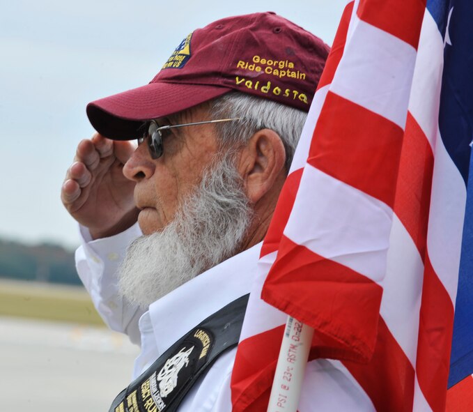 MOODY AIR FORCE BASE, Ga. -- Willie Black, a member of the Patriot Guard Riders, salutes Army Staff Sgt. Briand Williams, a fallen Soldier, here Dec. 3. Sergeant Williams served in the Army since 2002 and was killed in action in Iraq Nov. 22. He was assigned to the 1st Battalion, 10th Field Artillery Regiment, 3rd Brigade Heavy Combat Team, 3rd Infantry Division at Fort Benning, Ga. (U.S. Air Force photo by Staff Sgt. Schelli Jones)