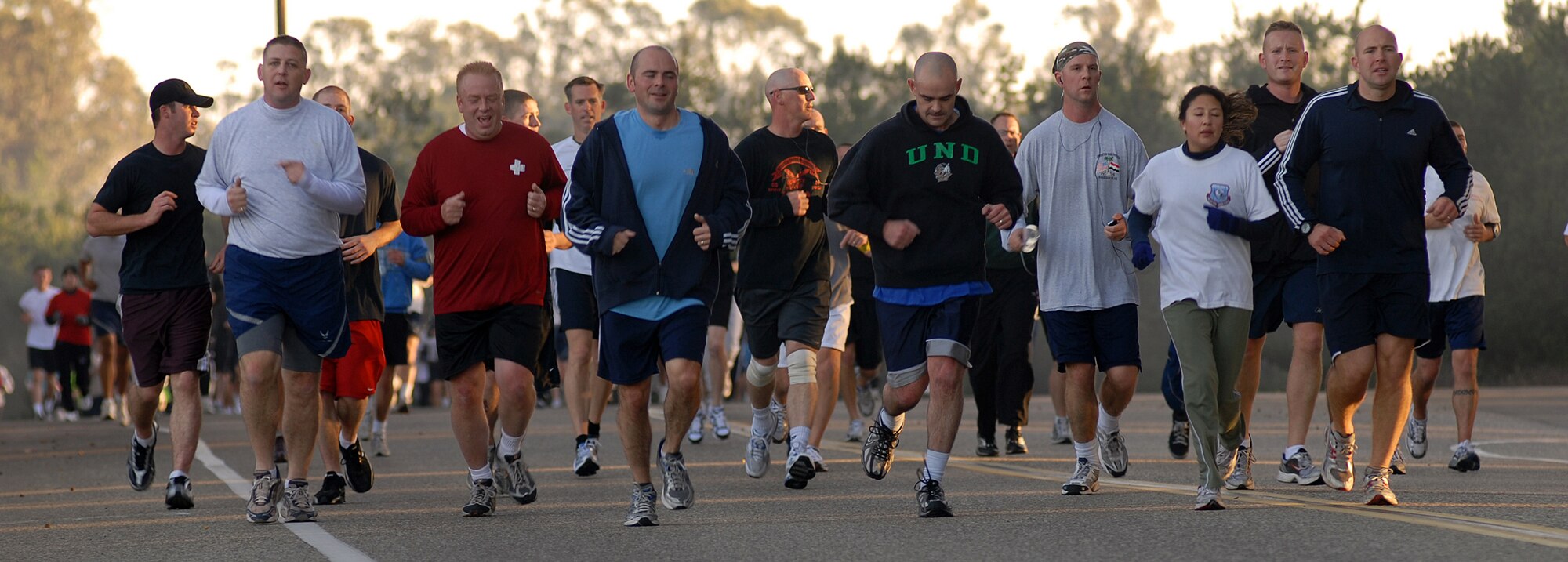 VANDENBERG AIR FORCE BASE, Calif. – Members from the 14th Air Force and 30th Space Wing participate in Vandenberg’s 10K Wingman Run on Friday, Dec. 4, 2009 here. "The success of the day rests on engaging with other Airmen and placing special emphasis on the importance of identifying risk factor behavior," said Maj. Jennifer Vecchione, the event coordinator. (U.S. Air Force photo/Airman 1st Class Kerelin Molina)