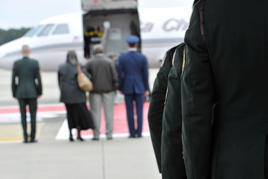 MOODY AIR FORCE BASE, Ga. -- Members of the 198th Infantry Honor Guard from Fort Benning, Ga., begin to march toward an aircraft that is carrying Army Staff Sgt. Briand Williams, a fallen Soldier, here Dec. 3. Sergeant Williams is from Sparks, Ga., and has served in the Army since June 2002. (U.S. Air Force photo by Staff Sgt. Schelli Jones)
