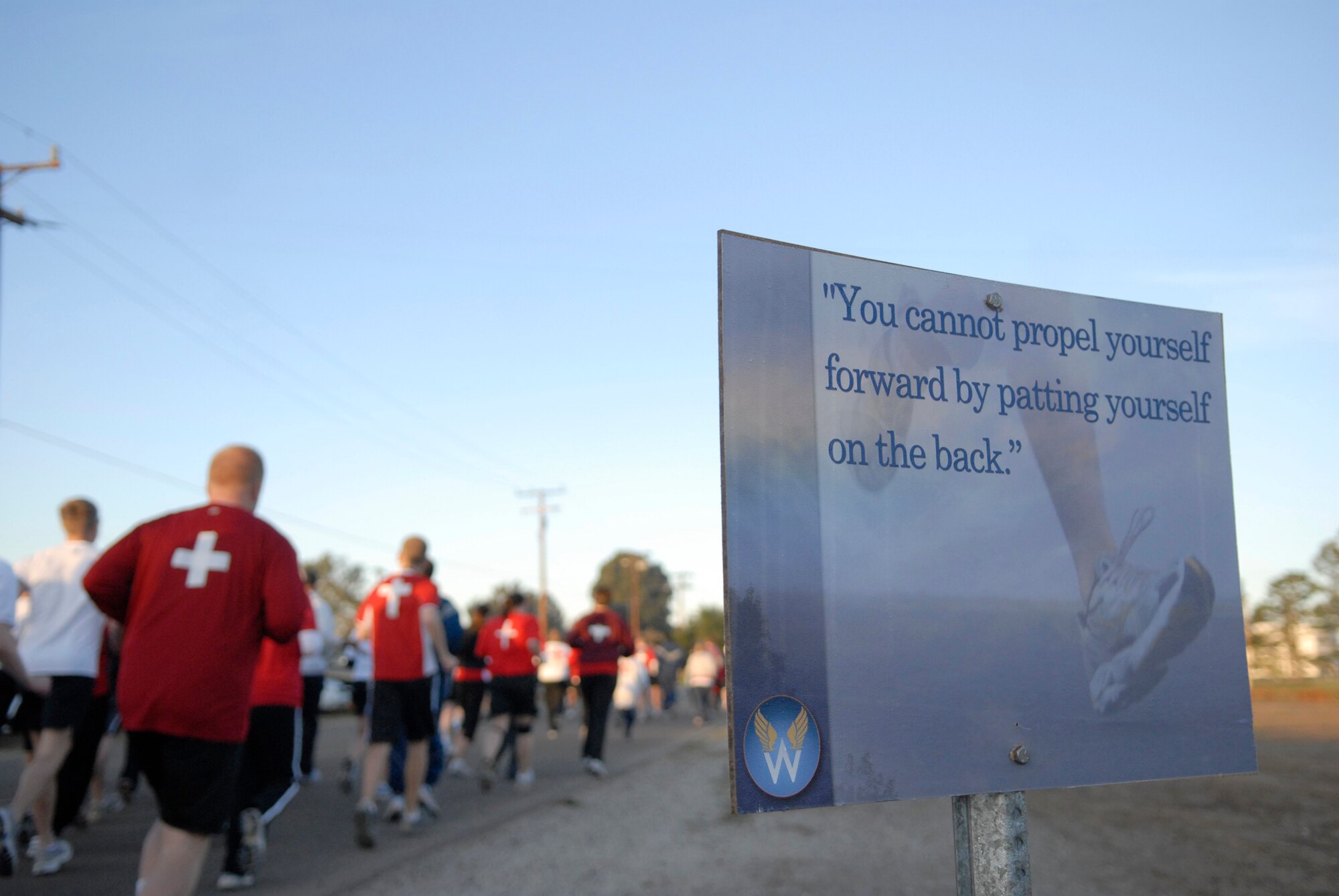 VANDENBERG AIR FORCE BASE, Calif. -- Airmen kick off Wingman Day with a 10K run here Friday, Dec. 4, 2009.  The day's events were meant to promote teamwork and taking care of fellow Wingmen.  (U.S. Air Force photo/Senior Airman Andrew Satran)