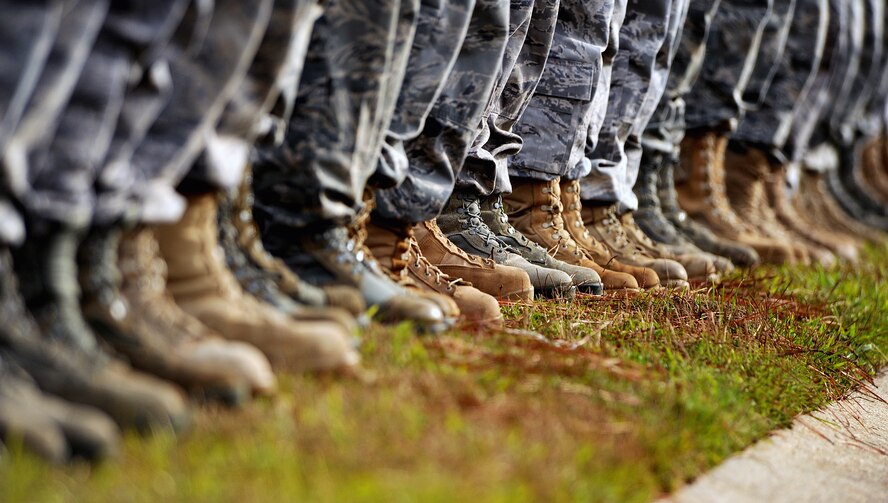 MOODY AIR FORCE BASE, Ga. -- Airmen from the 824th Security Forces Squadron, stand at parade rest waiting to pay their respects during the dignified transfer for U.S. Army Staff Sgt Briand T. Williams, a fallen soldier from Fort Benning, Ga. here Dec. 3. Sergeant Williams died Nov 22 in Iraq of wounds sustained when insurgents attacked his unit using small arms fire. (U.S. Air Force photo by Airman 1st Class Joshua Green)