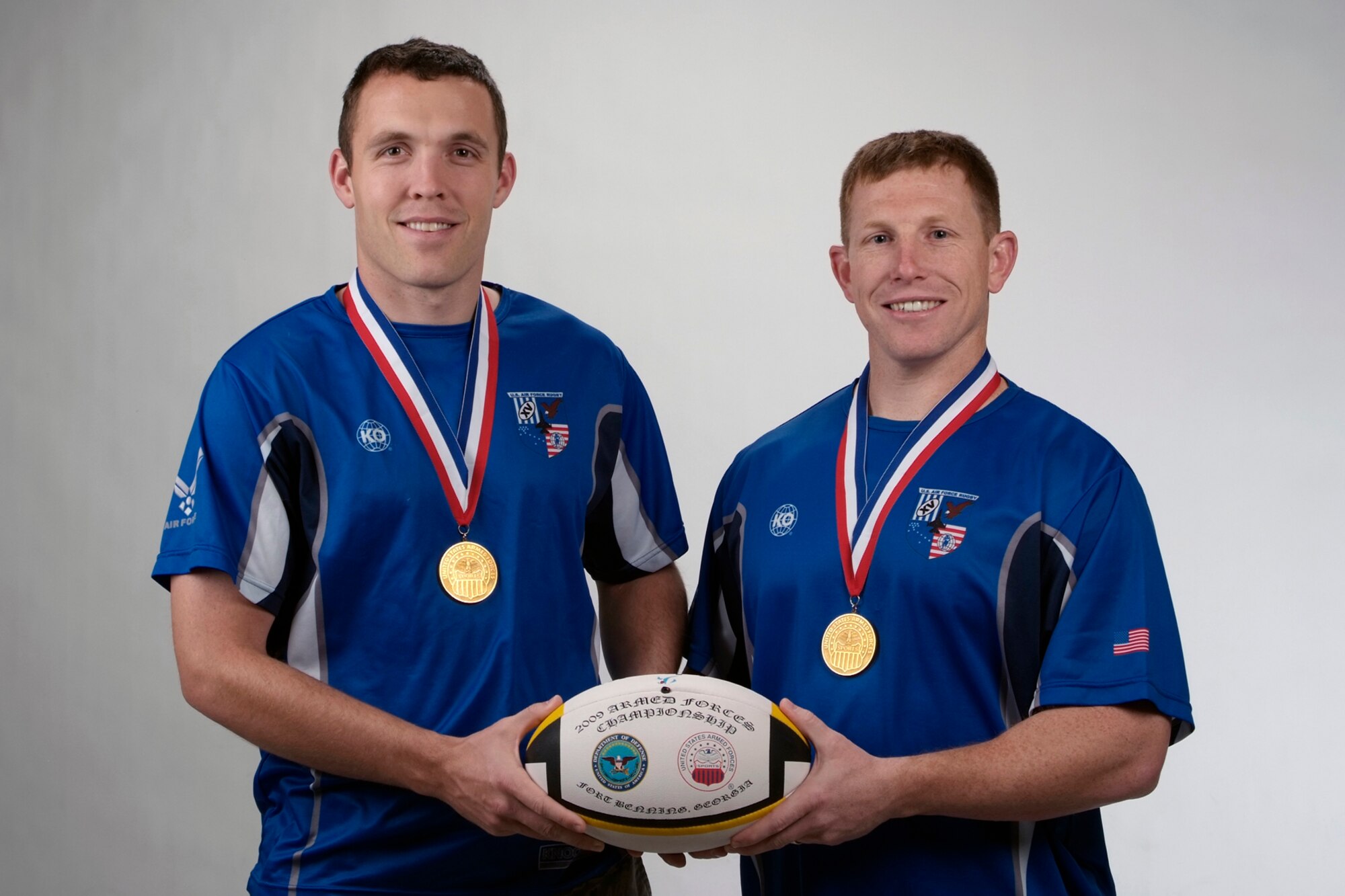 Marc Ward (left), Space Force Enhancement test analyst for Air Force Operational Test and Evaluation Center, and Thomas Beers, 721st Mission Support Group operations officer, are members of the 2009 Air Force rugby team. Air Force decisively won its sixth consecutive gold medal at the annual Armed Forces Rugby Championship tournament Nov. 13 at Fort Benning, Ga. In five games, Air Force outscored the opposition 226-3. Air Force then went on to defeat the Royal Australian Air Force rugby team, which had challenged Air Force to the match. (Air Force photo by Larry Hulst)