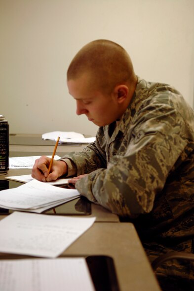 A SERE student develops a lesson plan during the Teaching Techniques portion of SERE training. (U.S. Air Force photo/Senior Airman Emerald Ralston)