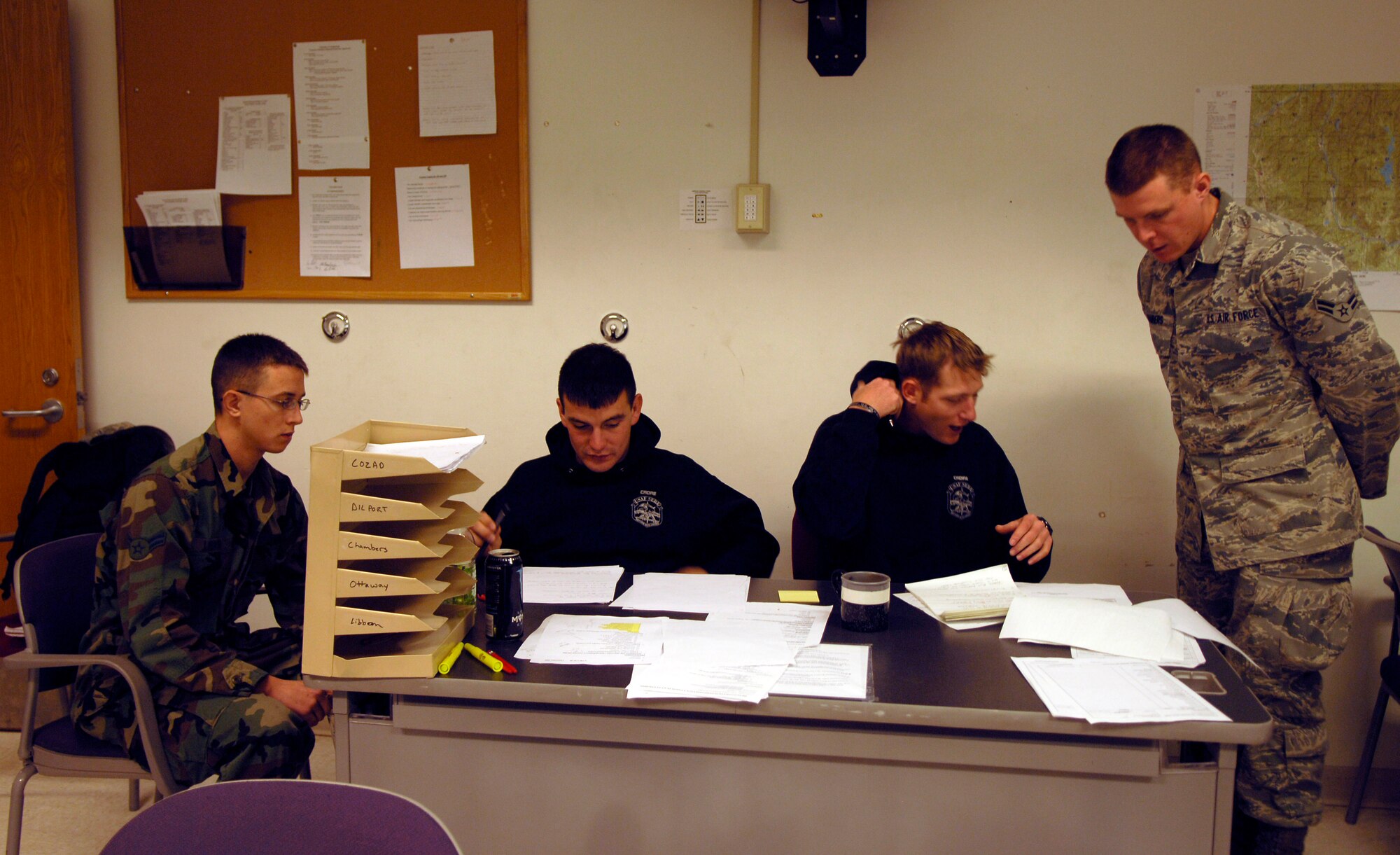 Survival, Evasion, Resistance and Escape instructors evaluate SERE students’ lesson plans during the Teaching Techniques phase of training. (U.S. Air Force photo/Senior Airman Emerald Ralston)