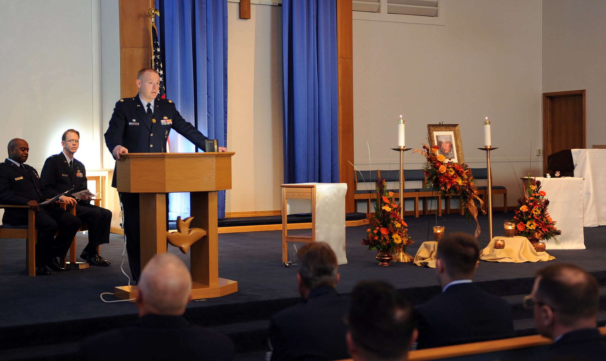 MOUNTAIN HOME AIR FORCE BASE, Idaho -- Maj. Earl Layne, 366th Security Forces Squadron commander, speaks during a memorial service for Airman 1st Class Ryan Matthews at the base chapel Nov. 25. Airman Matthews was assigned to the 366th Security Forces Squadron and died in a vehicle rollover Nov. 18. (U.S. Air Force photo by Airman 1st Class Debbie Lockhart)