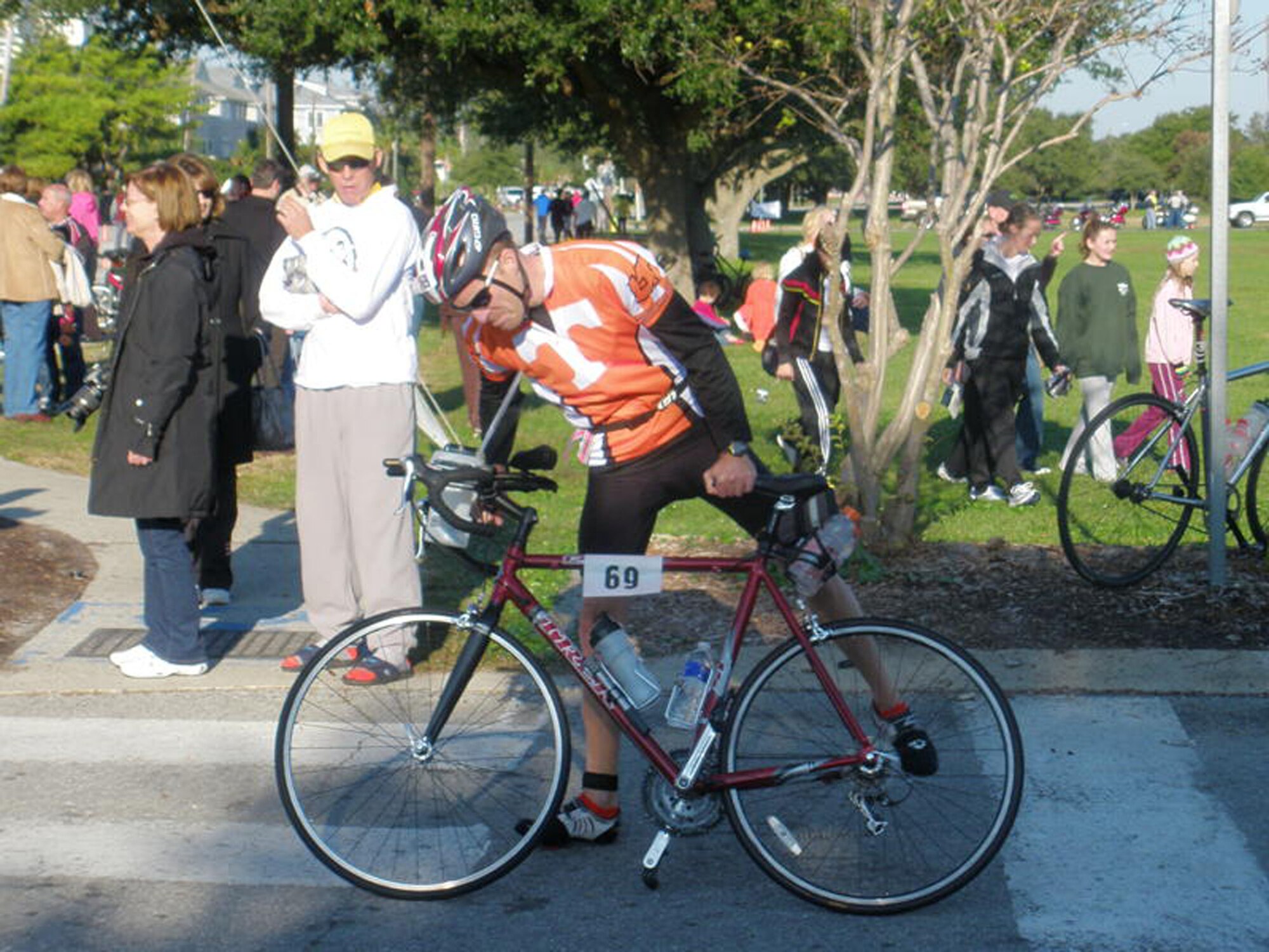 Lt. Col. James Barber prepares his bicycle for a 112-mile ride in the second phase of a recent iron-distance triathlon. The first phase was a swim of 2.4 miles. The third was a 26-mile run. Colonel Barber is the commander of the 42nd Medical Support Squadron.(U.S. Air Force courtesy photo)