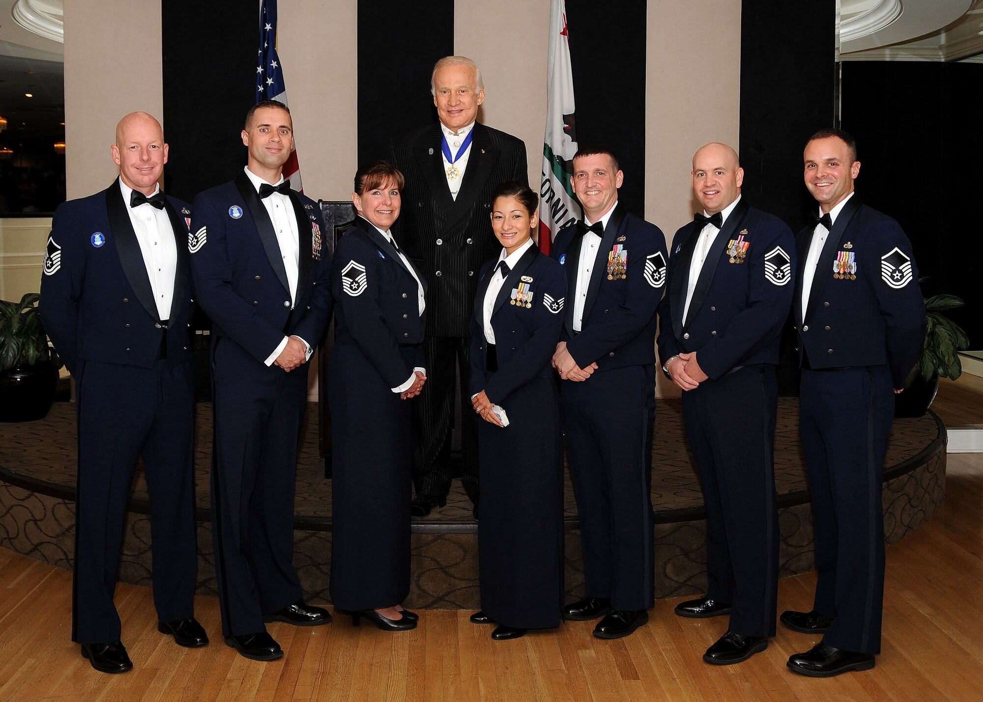 Staff Sgt. Johanna Aviles (front row, forth from left), Space and Missile Systems Center Space Logistics Group, was one of the 12 recipients of the 2009 Outstanding Airman of the Year awards during the 38th Air Force Association Ball held in Beverly Hills, Nov. 20. Recipients who attended the event had the opportunity to meet NASA Astronaut and retired Air Force Col. Buzz Aldrin (top row). They are (left to right):  Master Sgt. Christopher Pollock, Lackland Air Force Base, Texas; Technical Sgt. Benjamin Horton, Hill AFB, Utah; Senior Master Sgt. Mary Bechdel, Kadena Air Base, Japan; Staff Sgt. Johanna Aviles Los Angeles AFB, Calif.; Master Sgt. John Carter, Royal AF Mildenhall, England; and Senior Master Sgt. Jeffery Steagall, Peterson ABF, Colo. Master Sgt. Jason Hughes (right), one of last year’s OAY, helped with the transition. (Photo by Lou Hernandez) 