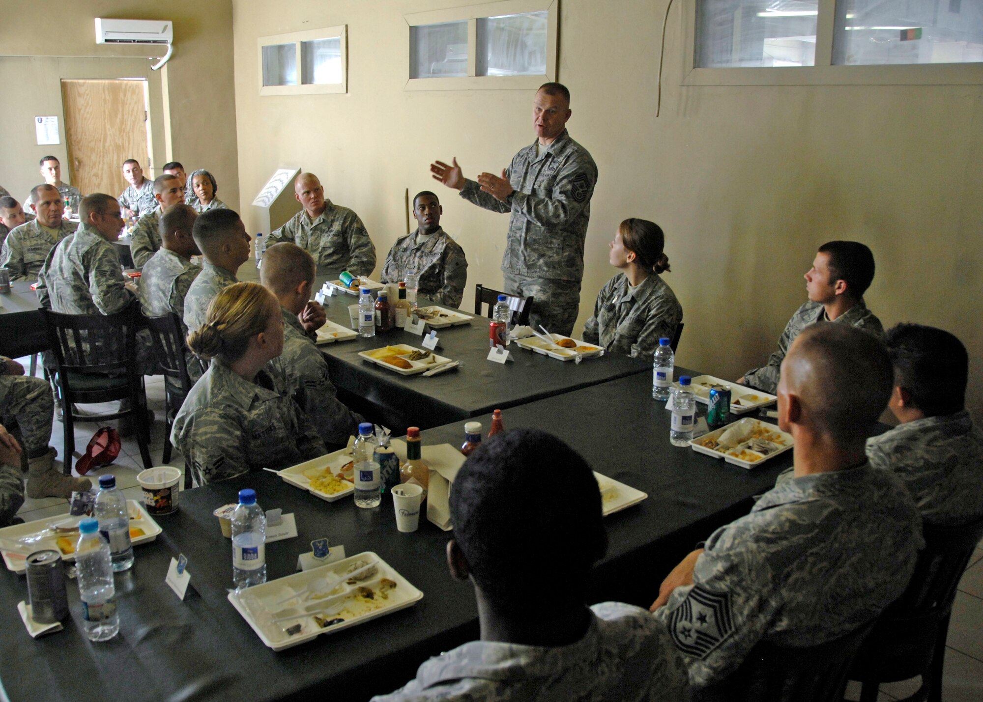 Chief Master Sgt. of the Air Force James A. Roy speaks to Airmen explaining how experiences in a combat environment will benefit them in their future careers Nov. 30, 2009 at Kandahar Airfield, Afghanistan. Chief Roy also took time after the luncheon to answer Airmen's questions about current events and future plans for the Air Force. (U.S. Air Force photo/Senior Airman Timothy Taylor)