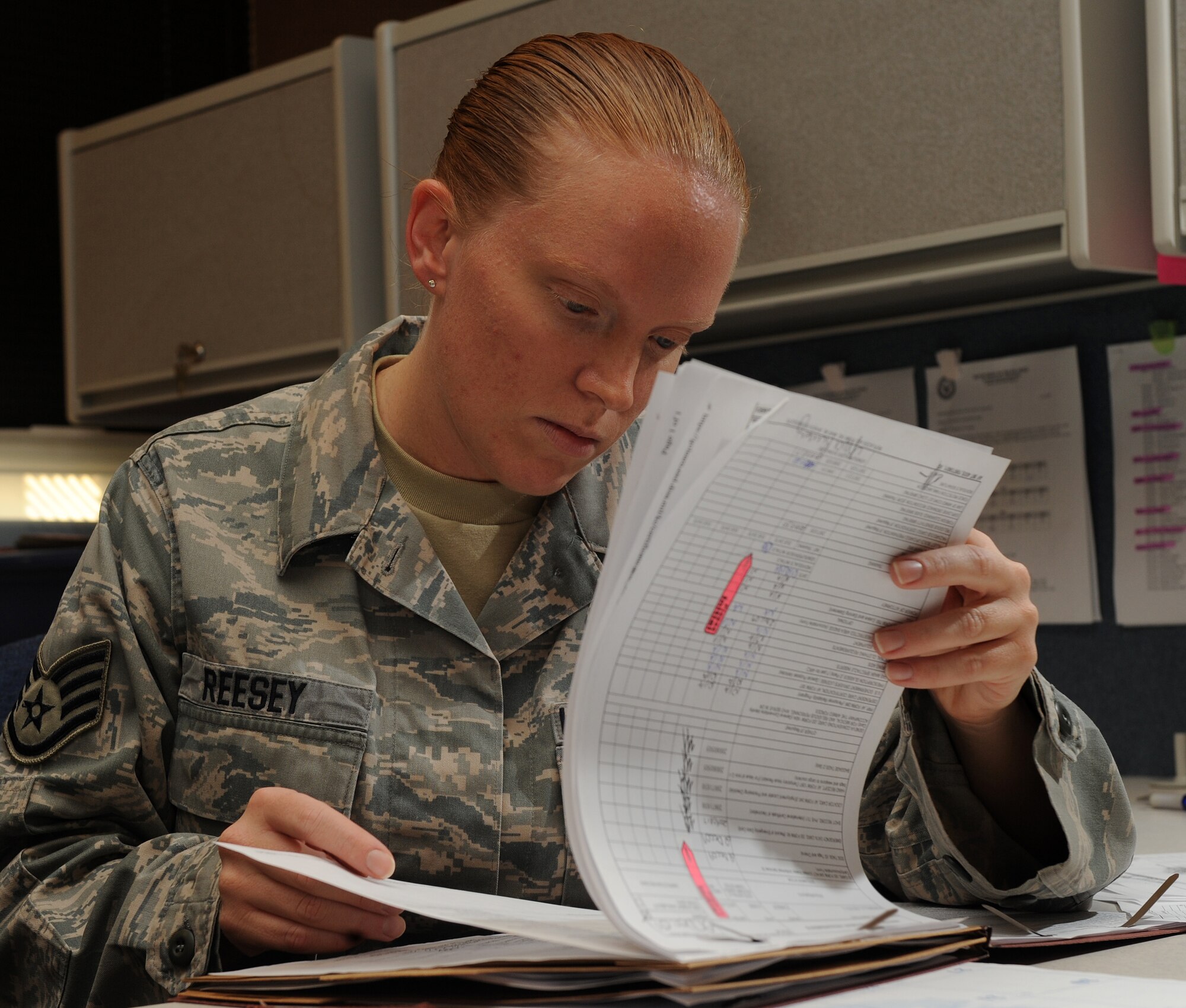 LANGLEY AIR FORCE BASE, Va. --  Staff Sgt. Lisa Reesey, 1st Comptroller Squadron unit deployment manager, looks over a mobility folder during the Operation Readiness Exercise Dec. 4.  Wing Exercise Evaluation Team members assessed the ability of 1st Fighter Wing units to deploy cargo, aircraft and Airmen within a limited timeframe.  (U.S. Air Force photo/Senior Airman Zachary Wolf)