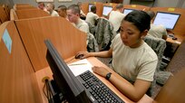 Airmen from the 344th Training Squadron take a test at Lackland's newly expanded national testing center. The center added 11 testing stations and now offers professional military education testing at no cost. (U.S. Air Force photo/Robbin Cresswell)