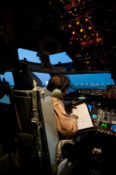 Capt. Adam Kornitzer, 340th Expeditionary Air Refueling Squadron pilot, conducts a preflight check of a KC-135 Stratotanker, Dec. 2, 2009, in Southwest Asia. The 340 EARS Airmen fly a variety of missions providing aerial refueling of U.S. and Coalition aircraft throughout the U.S. Central Command area of responsibility in support of operations Iraqi Freedom and Enduring Freedom. (U.S. Air Force photo/Staff Sgt. Robert Barney)