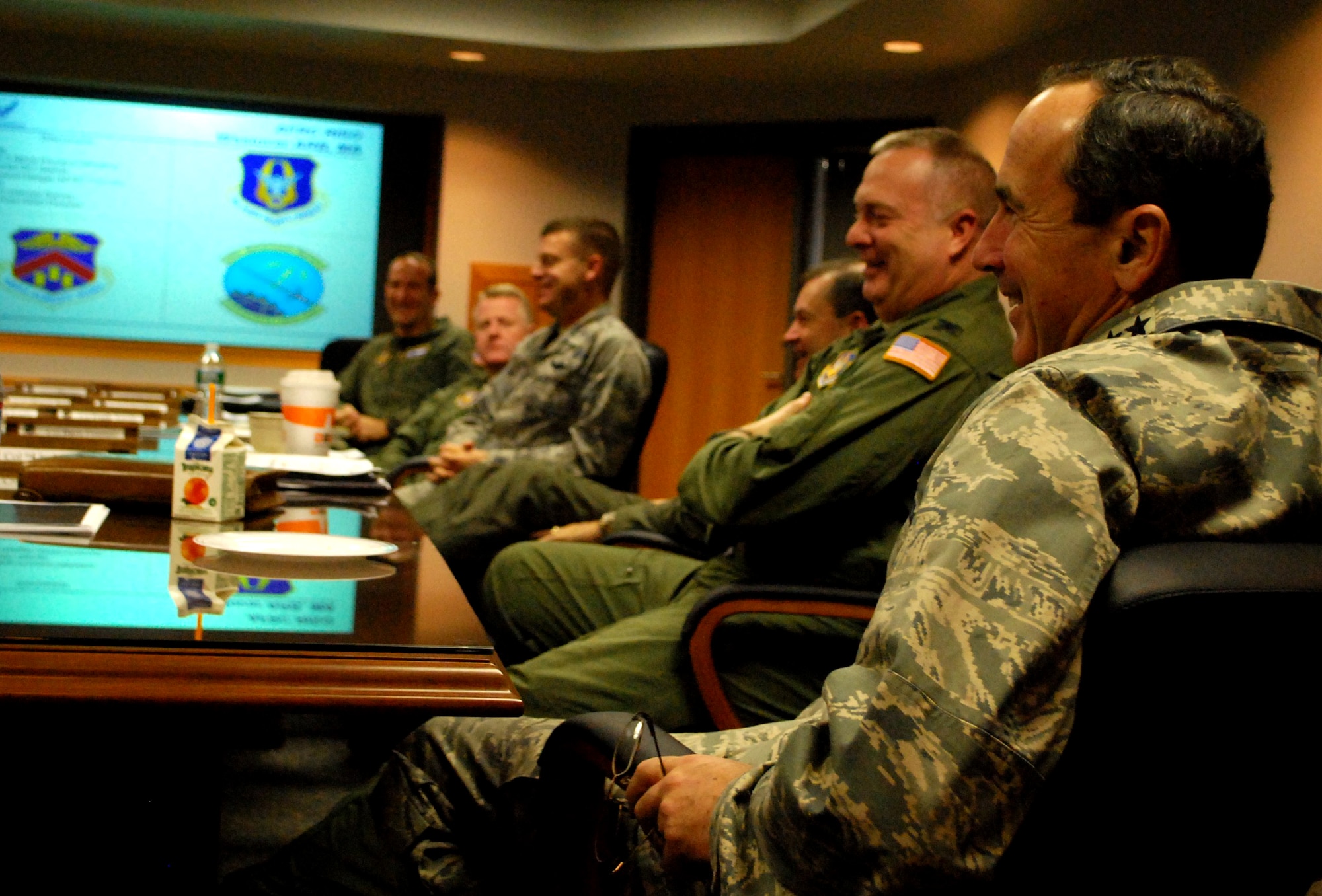 Gen. Raymond E. Johns Jr., commander of Air Mobility Command, shares discussion with the
senior leadership of the 439th Airlift Wing during a mission briefing Dec. 2. General Johns visited Westover Dec. 1-2
and also toured Westover's isochronal inspection area. General Johns visited Westover to meet with AMC Airmen
and learn more about the command's current mission directly from them. This is the general's first trip as
commander of AMC. General Johns has made these trip his first priority to "get out and see the mission through the
eyes of AMC's amazing Airmen." The general's first stateside trip includes visits to Guard, Reserve and active duty
bases in Ohio, New York, Massachusetts, New Hampshire and New Jersey.