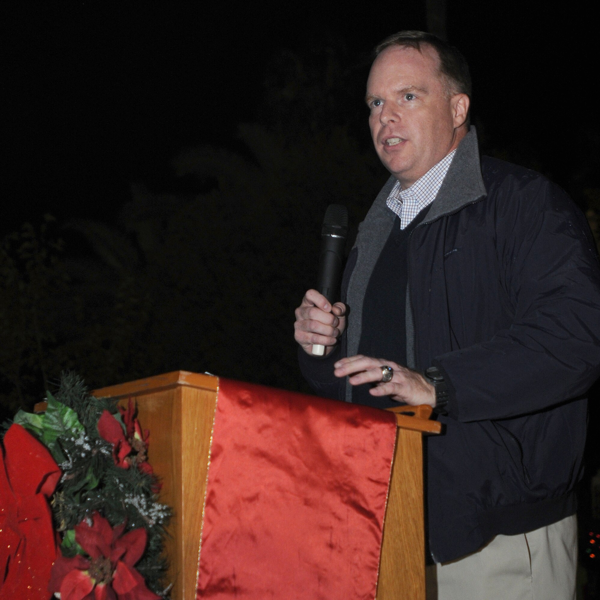 Col. Eric Beene, 39th Air Base Wing commander, welcomes everyone to Incirlk’s tree lighting ceremony Thursday, Dec. 3, 2009 at the base chapel. The tree lighting ceremony is held every year during the holiday season to bring Airmen and their families together by lighting the base Christmas tree, serving cookies and hot chocolate, and a special visit from Santa.  (U.S Air Force Photo/Senior Airman Ashley Wood)