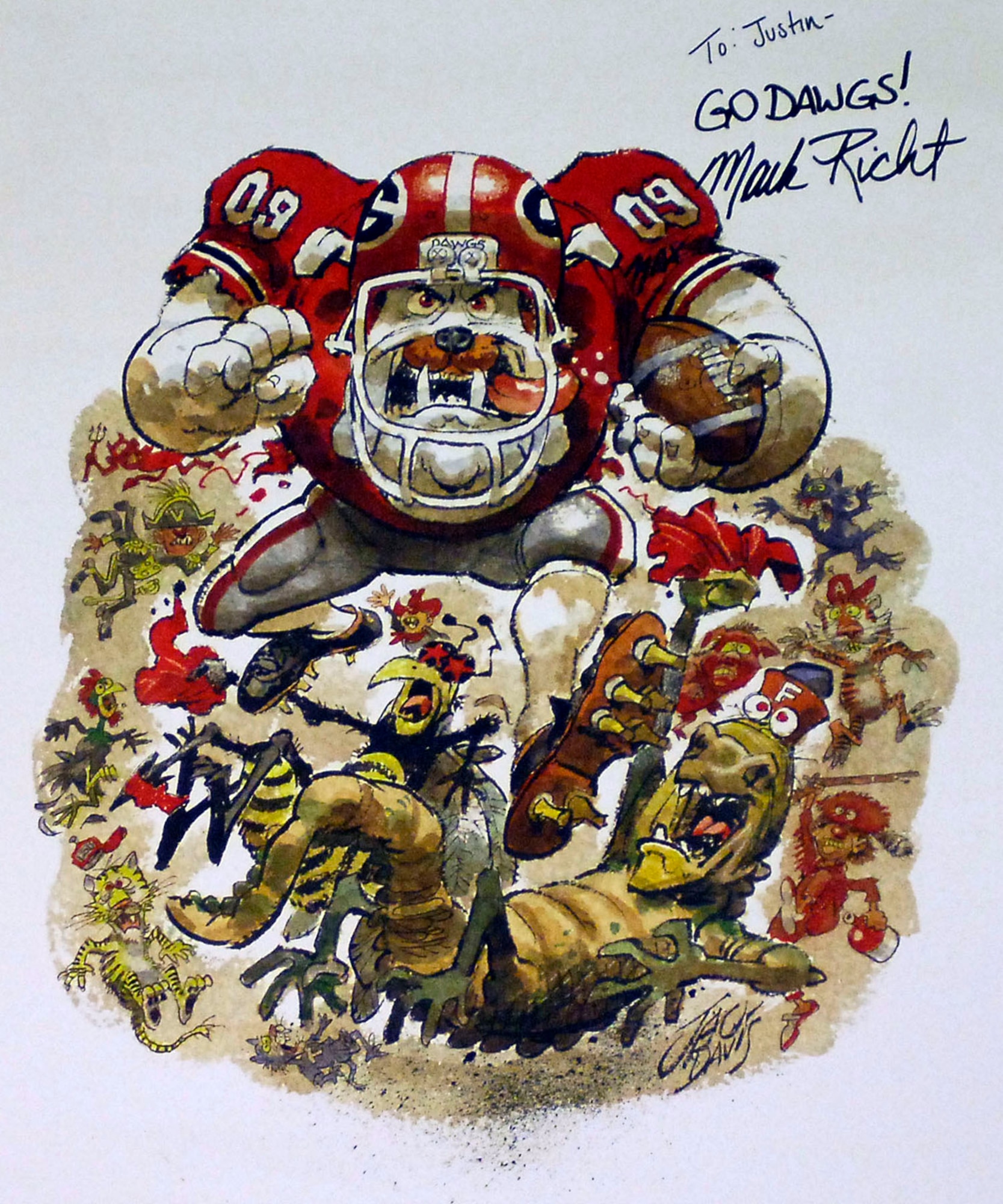 BAGRAM AIRFIELD, Afghanistan - A University of Georgia caricature, signed by football head coach Mark Richt, hangs over a trauma bed at the Craig Joint Theater Hospital here. Many NCAA teams, especially those from the South Eastern Conference sent memorabilia re to brighten the spirits of the wounded servicemembers and staff. (U.S. Air Force photo/Senior Airman Felicia Juenke)