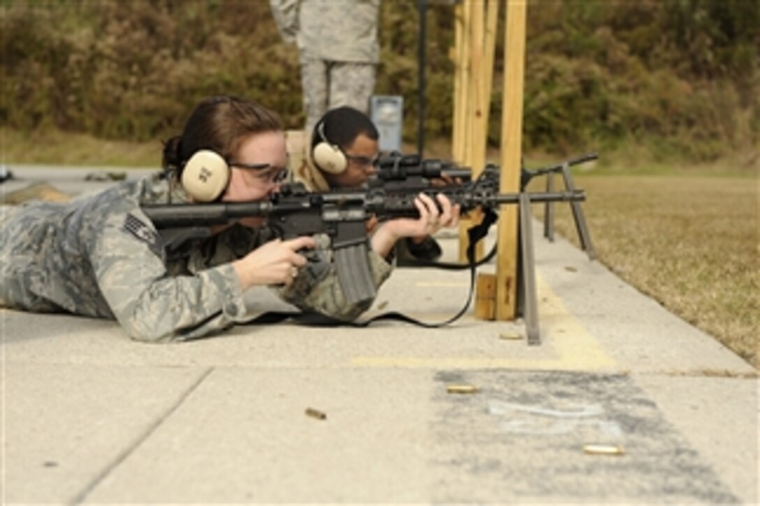U.S. Air Force Staff Sgt. Michelle Bates, from the Civil Engineering Squadron, qualifies on the M-4 Carbine at Naval Weapons Station Charleston, S.C., on Nov. 30, 2009.  