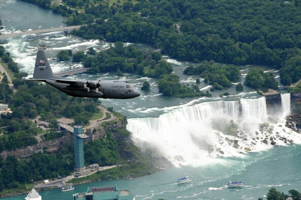 Niagara Falls Air Force Reserve and National Guard C-130?s exercise flying over Niagara Falls NY, July 15, 2009. The exercise was to train in evasive maneuvers and for a photographic mission over Niagara Falls. (U.S. Air Force photo/ Staff Sgt. Joseph McKee)