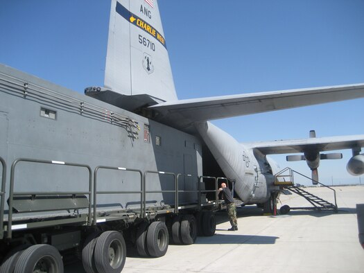 Senior Scout, a pallet-mounted communications and electronic intelligence system, is loaded onto a West Virginia Air National Guard C-130H3 Hercules aircraft, Aug. 17, 2009. The 130th Airlift Wing out of Charleston, W.Va. deployed to Salt Lake City, Utah for one month to participate in testing. Note the antenna arrays that were permanently attached to the paratroop door. (U.S. Air Force photo by Master Sgt. Debbie Turrill released)