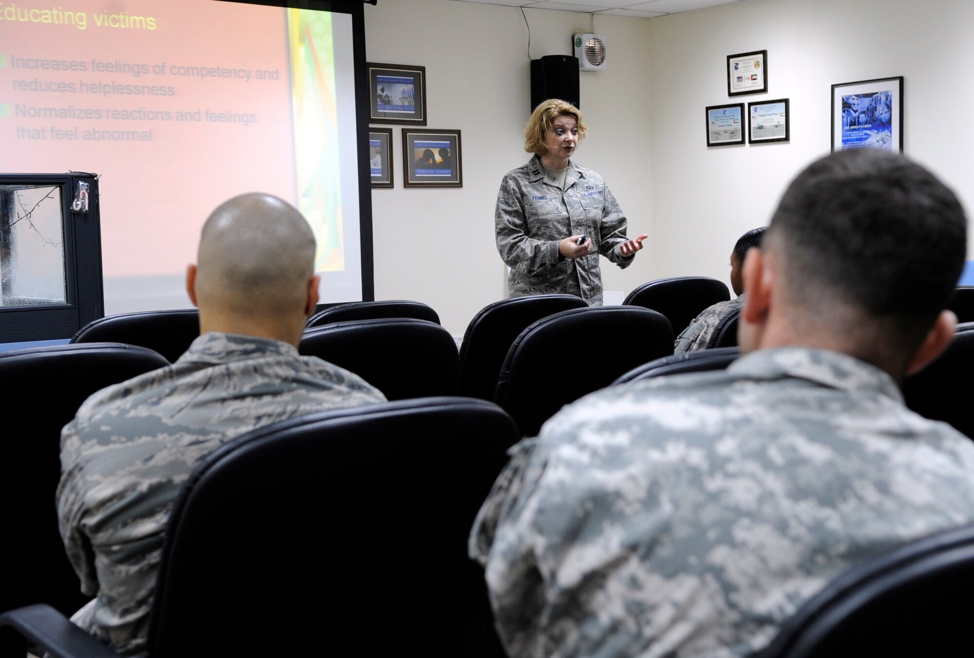 SOUTHWEST ASIA – Capt. Heather Fennel, 380th Air Expeditionary Wing Sexual Assault Response Coordinator, briefs servicemembers during victim advocate training Dec. 4, 2009. She trained 11 Airmen and Soldiers as victim advocates in a course from Nov. 29 – Dec. 4, 2009. Captain Fennel is deployed from Royal Air Force Lakenheath, England, and calls Rochester, N.Y., home. (U.S. Air Force photo/Senior Airman Stephen Linch)