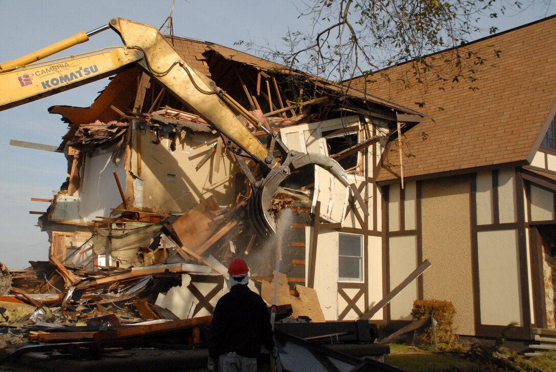 After many years of service at the Niagara Falls Air Reserve Station, NY the Airman's quarters, building 502 and 504 are being demolished by construction crews on December 2nd 2009 to make way for the new Community Activities Center.  The new facility is scheduled to break ground later in 2010. (U.S. Air Force photo/Master Sgt. Peter Borys)