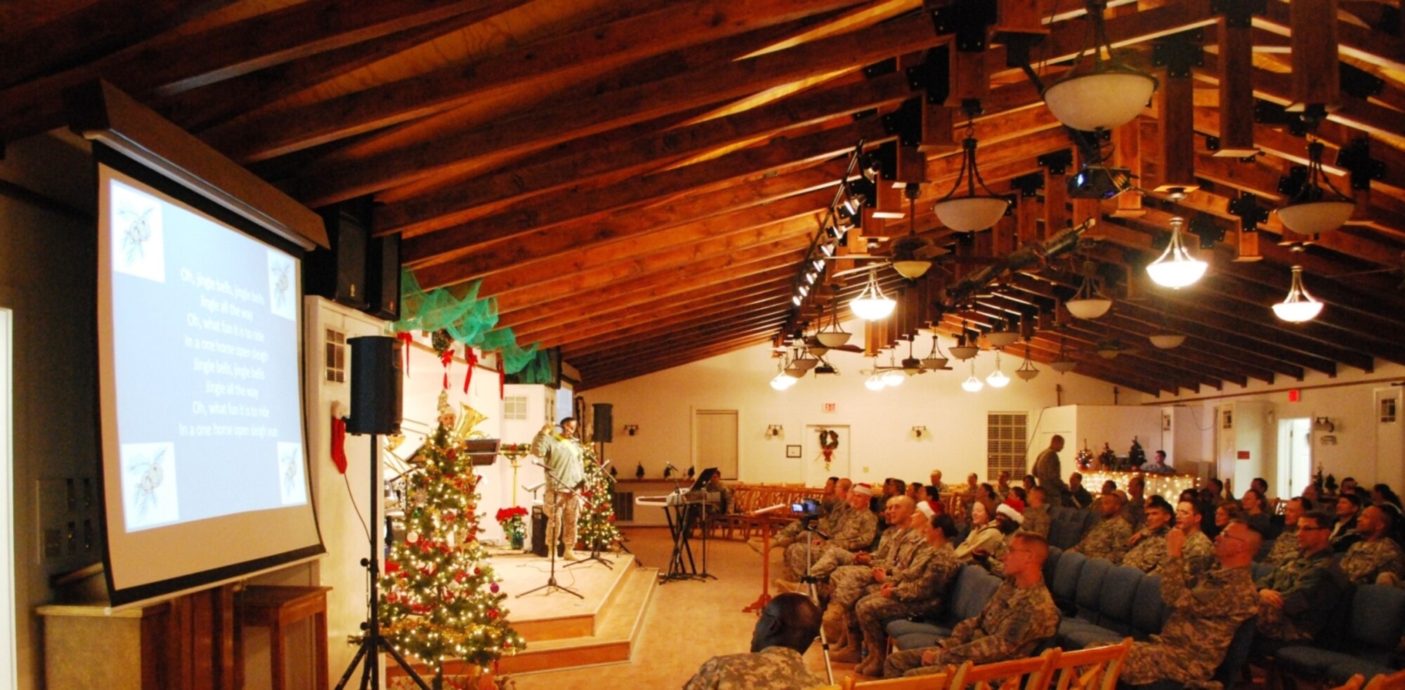 BAGRAM AIRFIELD, Afghanistan - Servicemembers supporting Operation Enduring Freedom welcomed the Christmas season with a few carols and a lot of cheer, Nov. 28, 2009 (U.S. Army photo/Capt. Thomas Cieslak)