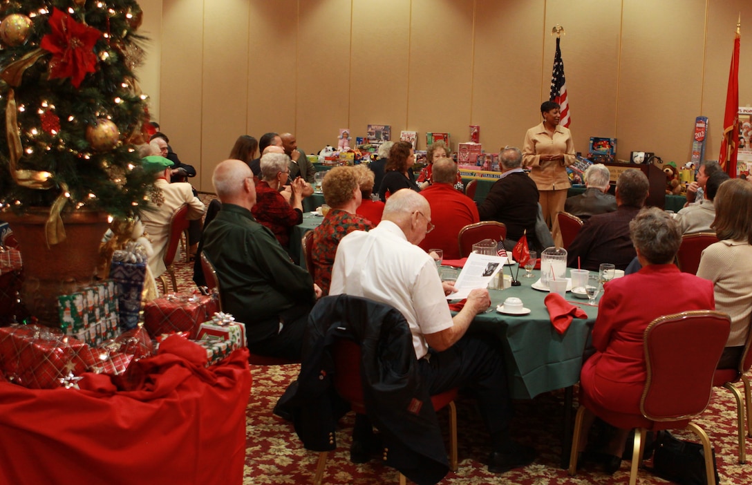 Sgt. Maj. Ramona D. Cook, sergeant major, Marine Corps Base Camp Pendleton, addresses members of the San Diego County Sergeants Major Association Christmas Luncheon and Toys for Tots event at the Camp Pendleton South Mesa Club, Dec. 5. The association received more than 3,000 toys towards the Toys for Tots drive this year.