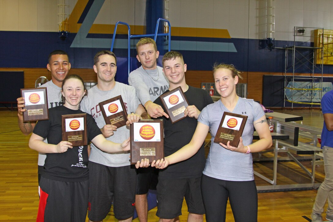 From left to right Jacob Moore, Katelyn Dubois, Garrit Fox, Justin Simons, Tony Orth and Rachael Moore pose with their first place plaques after the award ceremony following the championship game of the 8th Annual Dodge Ball Tournament held at IronWorks Gym here Saturday. Justin Simons was named the tournament’s most valuable player.