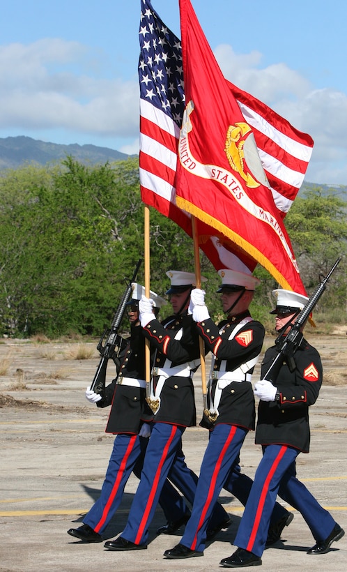 Marines retire the colors at the conclusion of the first Marine Corps Air Station Ewa Memorial Dec. 6 at what remains of Ewa field. MCAS Ewa could be the spot where U.S. service members first fired during WWII, according to John Bond, the event coordinator and avid WWII historian. (Official U.S. Marine Corps photo by Sgt. Juan D. Alfonso) (Released)