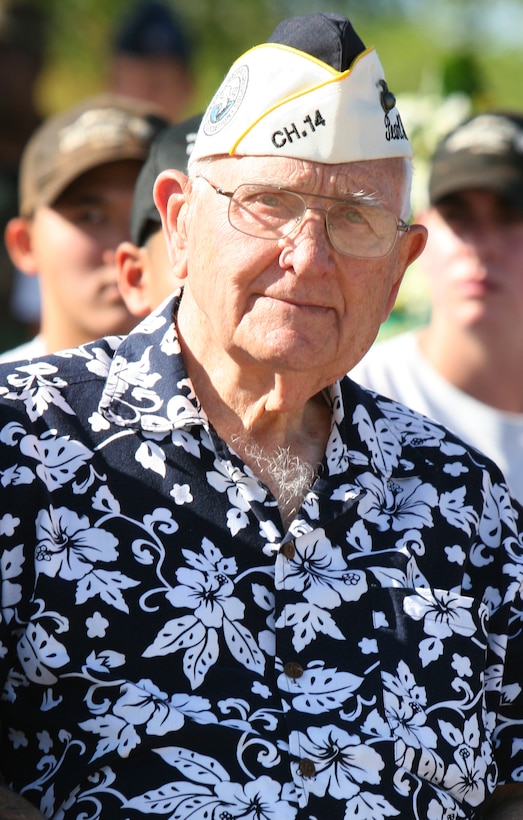 Retired Maj. John Hughes returned to what remains of Marine Corps Air Station Ewa Dec. 6 for the first memorial ceremony 68 years after the Japanese attacked on Pearl Harbor. Hughes was the first Marine to see Japanese bombers flying overhead toward Pear Harbor. 'I looked up and saw planes with a red ball on the side and a torpedo underneath,' he said. 'I knew what that meant so I ran to the guard shack and told them to start breaking out ammo.' (Official U.S. Marine Corps photo by Sgt. Juan D. Alfonso) (Released)