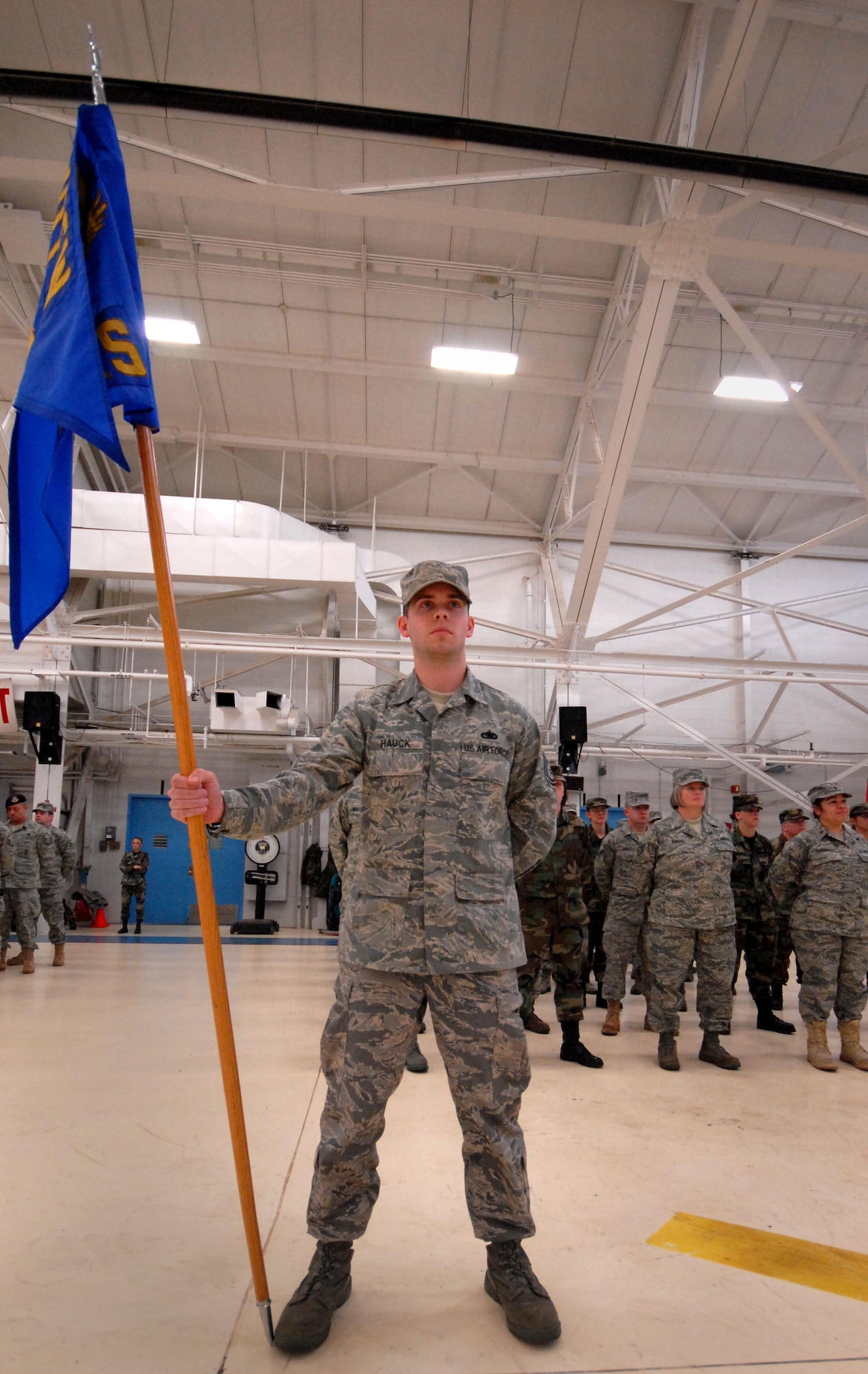Tech. Sgt. Gregory Hauck holds the 110th Logistics Readiness Squadron's guidon during the 110th Fighter Wing formation Saturday Dec, 5, 2009. (Photo by Tech. Sgt. Derek Blumke)
