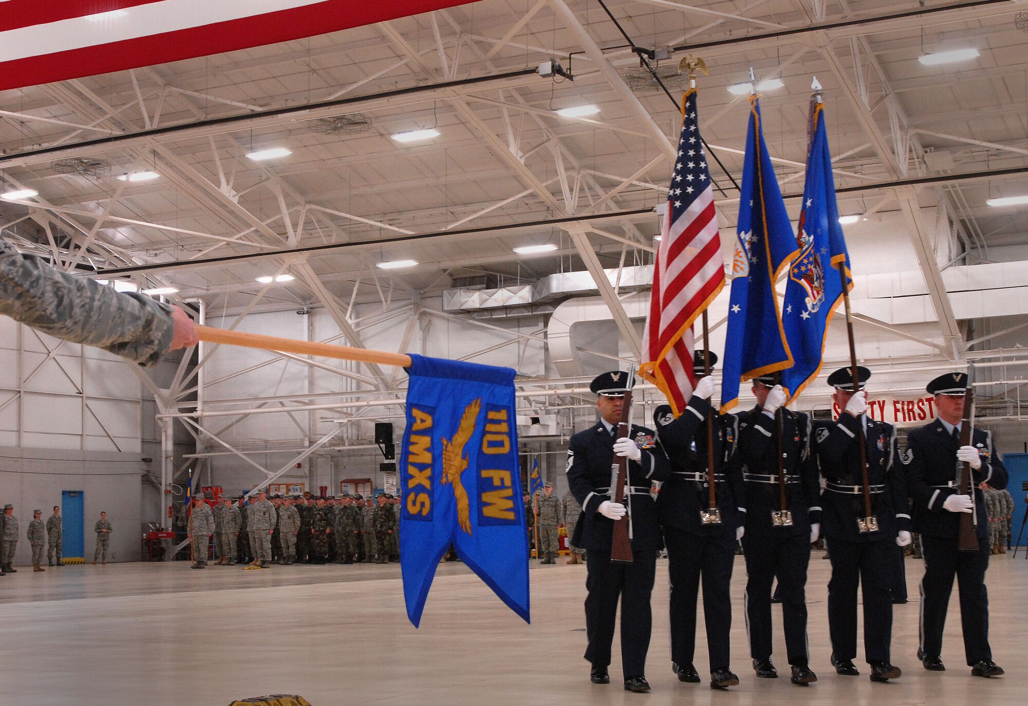 The Base Honor Guard retires the colors at the conclusion of the unit formation Saturday, Dec. 5, 2009.  (Photo by Tech. Sgt. Derek Blumke)