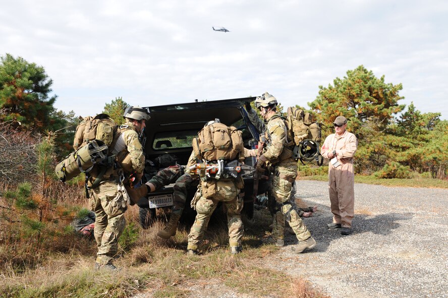 Members of the 103rd Rescue Squadron, 101st Rescue Squadron and the 106th Security Forces Squadron worked together during a search and rescue training exercise on November 3, 2009 at F.S. Gabreski (ANG) in Westhampton Beach, New York. The exercise simulated a downed HH-60 with a four-person crew, and was designed to ensure proficiency in patient treatment while working with supporting aircraft in a tactical environment


(U.S. Air Force photo/Senior Airman Chris S. Muncy UNRELEASED). 
