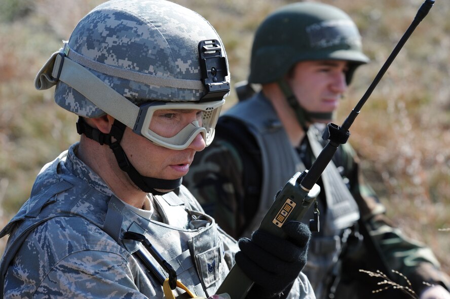 Members of the 103rd Rescue Squadron, 101st Rescue Squadron and the 106th Security Forces Squadron worked together during a search and rescue training exercise on November 3, 2009 at F.S. Gabreski (ANG) in Westhampton Beach, New York. The exercise simulated a downed HH-60 with a four-person crew, and was designed to ensure proficiency in patient treatment while working with supporting aircraft in a tactical environment


(U.S. Air Force photo/Senior Airman Chris S. Muncy UNRELEASED). 
