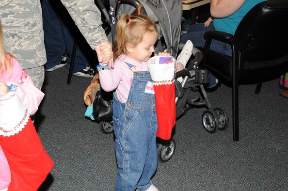 Every child received a stocking full of goodies and a gift from Santa Claus during the first annual children's holiday party (U.S. Air Force Photo/Capt Shane Huff)