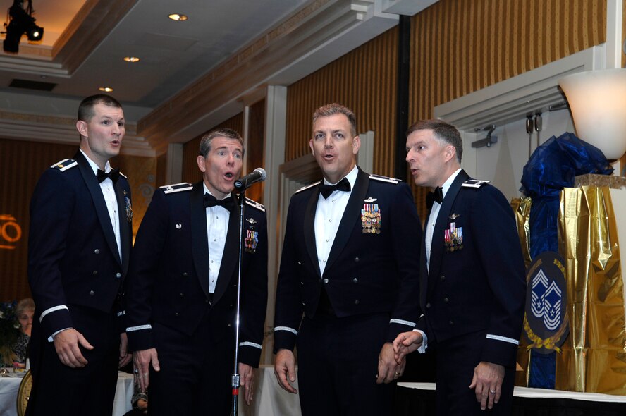 Members of the quartet "Wild Blue Yonder" sing during closing ceremonies at the Charter Chief golden anniversary celebration, Dec. 1. In 1959, 625 Airmen were promoted to the newly formed rank of chief master sergeant. (U.S. Air Force photo by Senior Airman Ryan Ivacic)