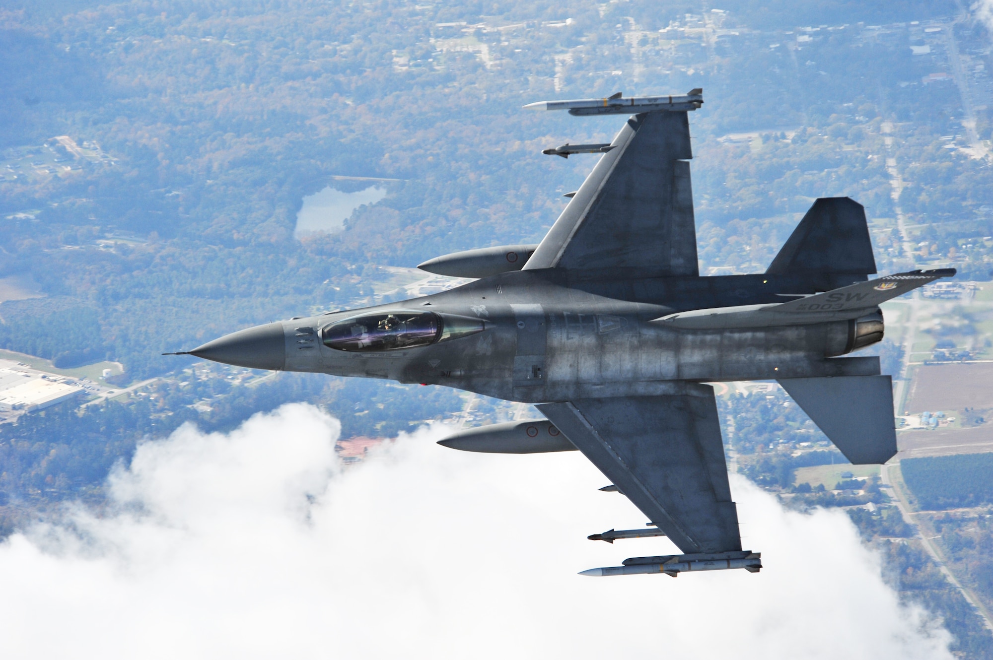 Capt. Matthew Feeman in an F-16 Fighting Falcon approaches a Cessna airplane, flown by South Carolina's Civil Air Patrol, to initiate a "head butt" as part of exercise Fertile Keynote Nov. 19, 2009 above South Carolina. A head butt is an action taken by the intercepting aircraft to redirect the intruder in the appropriate direction after other communications, like radio contact, have failed. Captain Feeman is an F-16 alert pilot from the 55th Fighter Squadron (U.S. Air Force photo/Senior Airman Michael Cowley)