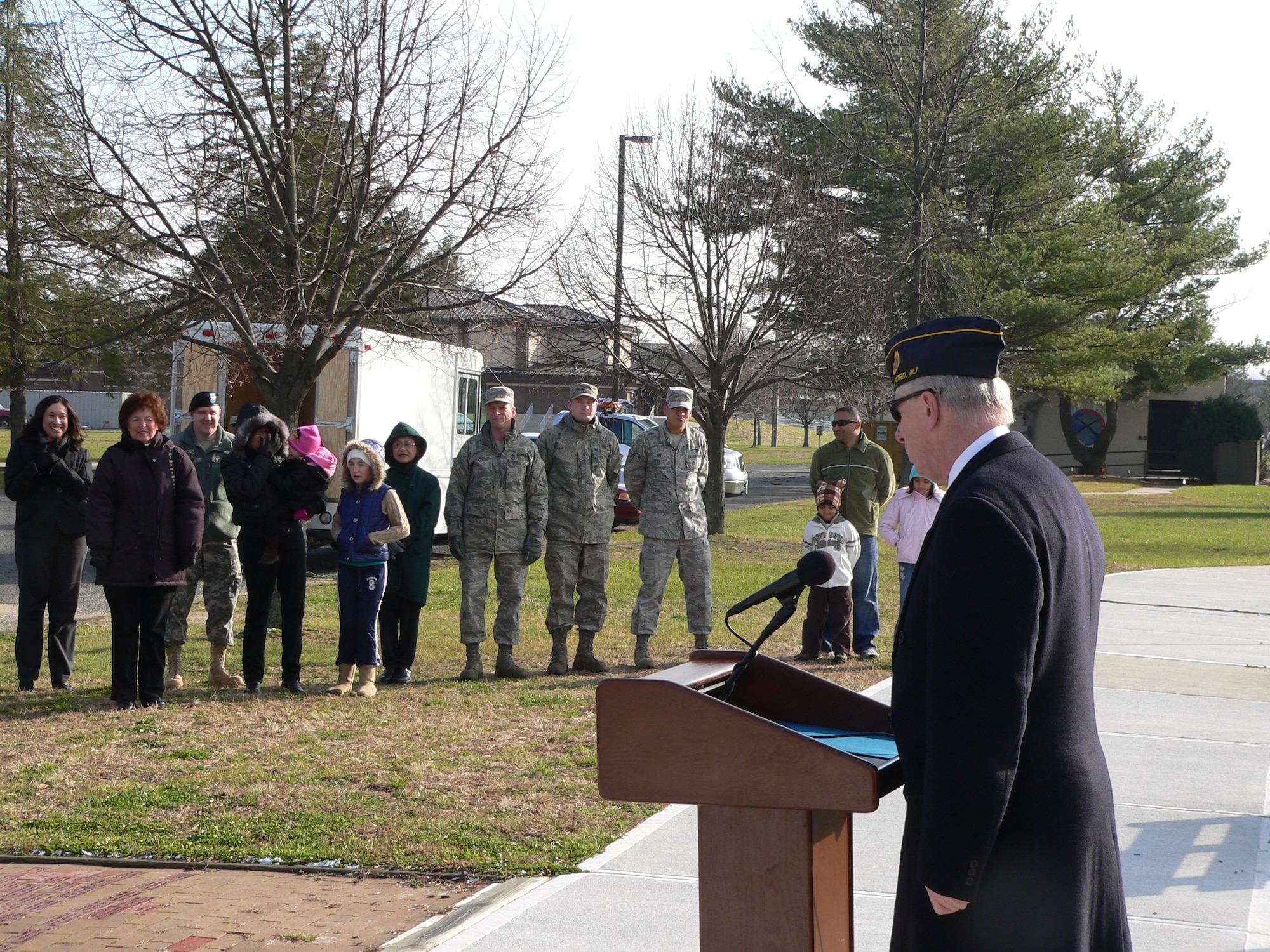 Roger Eastburn,  American Legion Post 37 commander, spoke at the unveiling of a plaque honoring Post 37's contributions to Wacky World Dec. 6 at McGuire. Post 37 provided three grills, eight trash cans, two benches, three picnic tables, two bouncy frogs and one mountain climber for the children of JB MDL servicemembers.  (U.S. Air Force photo by Steve Snyder)