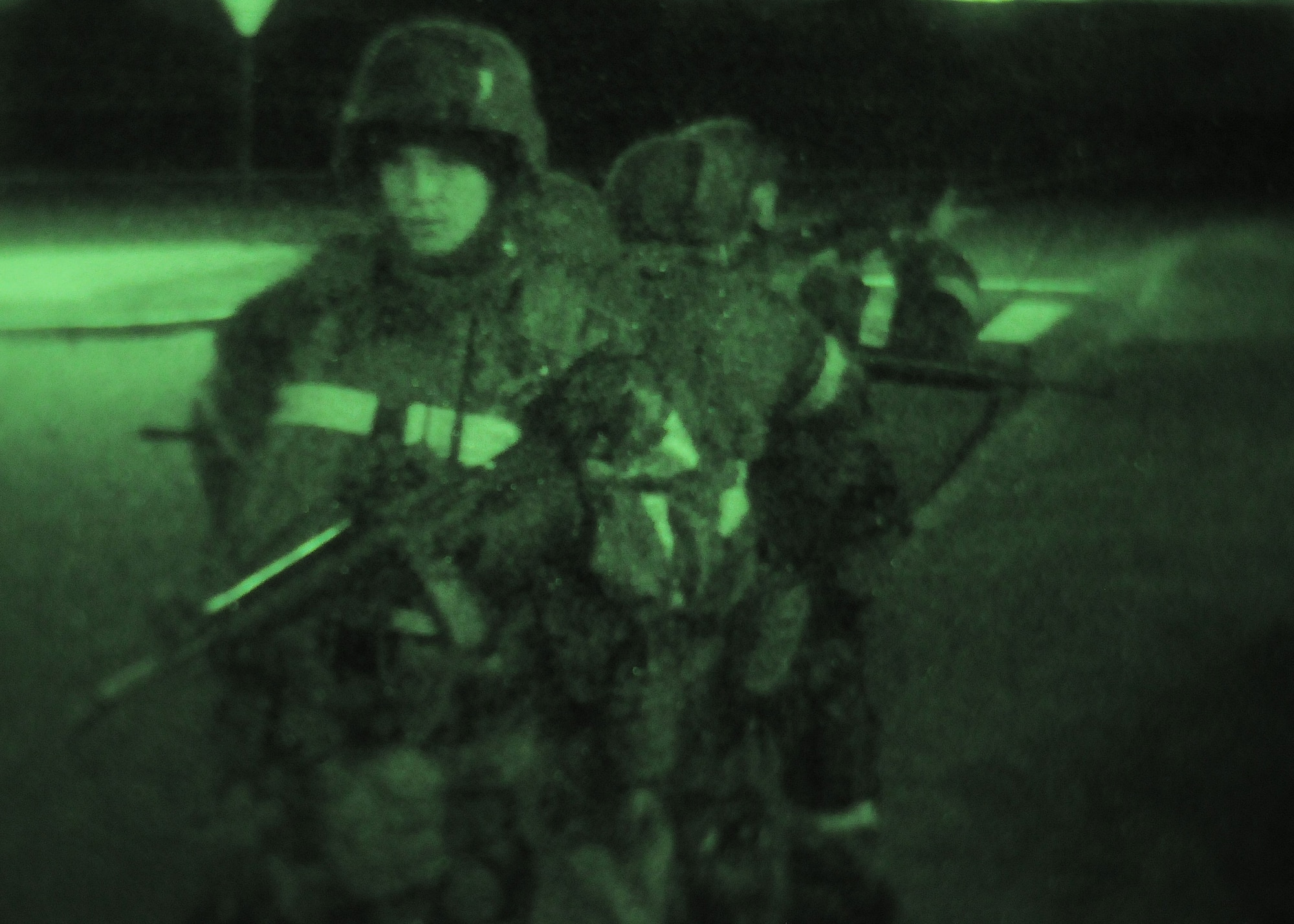 YOKOTA AIR BASE, Japan -- Augmentees with the 374th Security Forces Squadron train to move in low-light conditions Dec. 7 during an operational readiness inspection conducted by the Pacific Air Forces Inspector General. (U.S. Air Force photo/Airman 1st Class Michael Dillon)  