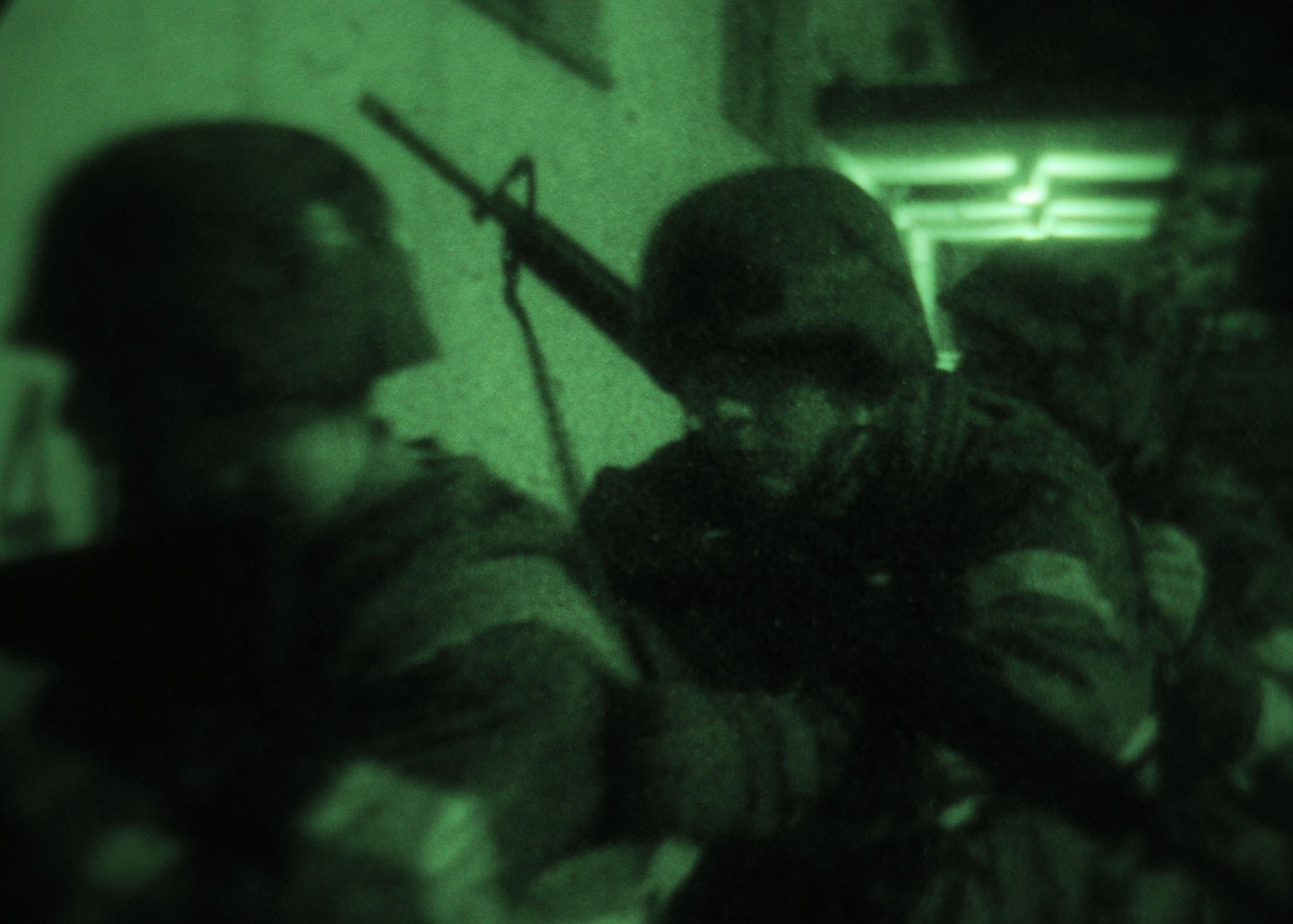 YOKOTA AIR BASE, Japan -- Augmentees with the 374th Security Forces Squadron train to move in low-light conditions Dec. 7 during an operational readiness inspection conducted by the Pacific Air Forces Inspector General. (U.S. Air Force photo/Airman 1st Class Michael Dillon)  