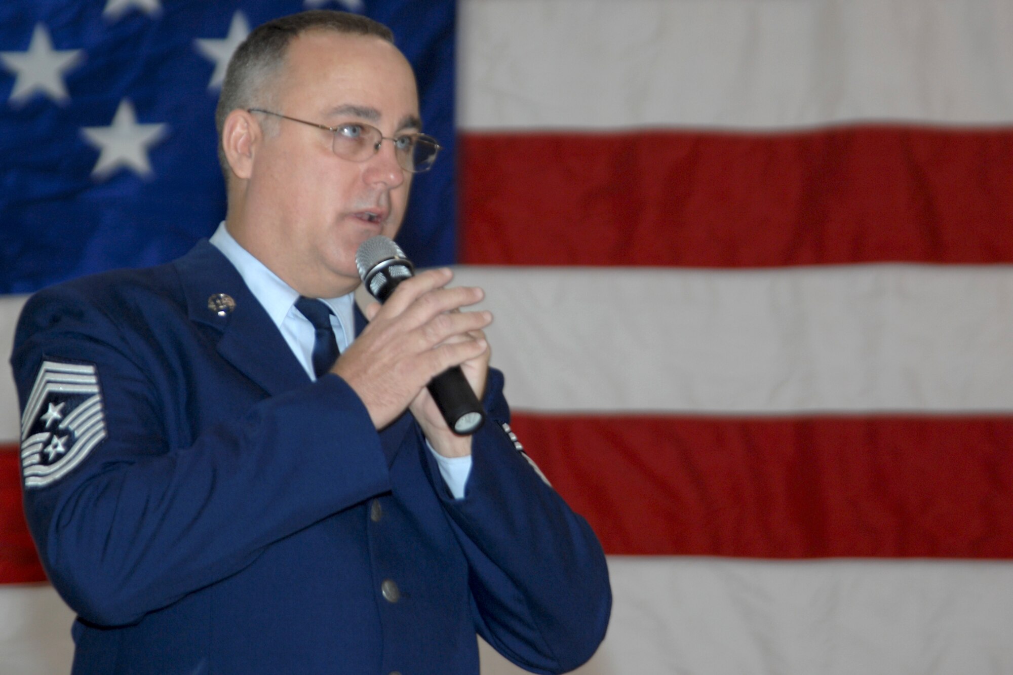 GRISSOM AIR RESERVE BASE, Ind., -- Chief Master Sgt. Larry Brady, 434th ARW command chief, addresses the unit during a commander's call held on the December unit training assembly. Commander's calls are vital to the unit allowing the commander and his staff the opportunity to address and recognize the unit face to face. (U.S. Air Force photo/Tech. Sgt. Doug Hays)