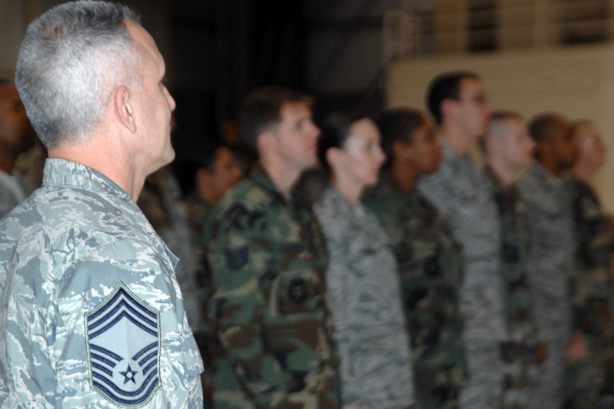 GRISSOM AIR RESERVE BASE, Ind., -- Chief Master Sgt. Kevin Cassidy, quality assurance superintendent, stands along with other NCO and Senior NCO inductees during a special promotion ceremony.  Grissom recognizes those members who are transitioning from one status to another,  from Airman to NCO, and NCO to Senior NCO ranks, and those making the rank of chief master sergeant.  (U.S. Air Force photo/Tech. Sgt. Doug Hays)