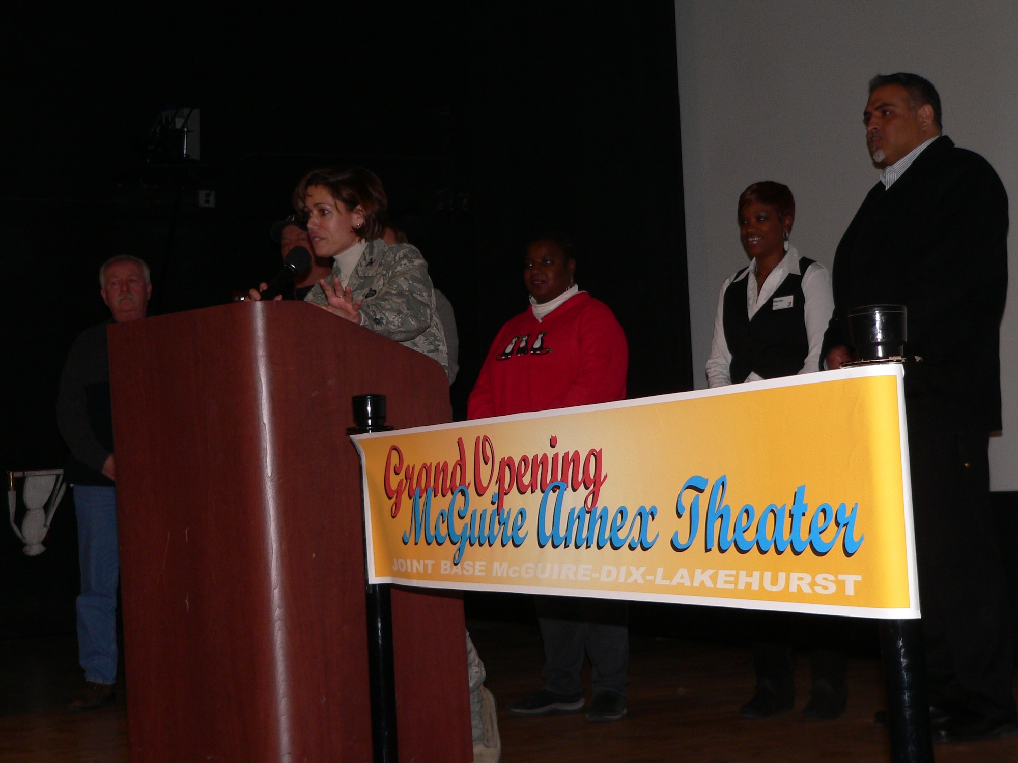 Joint Base McGuire-Dix-Lakehurst Commander Col. Gina Grosso speaks at the dedication ceremony of the renovated McGuire Theater Dec. 6. The ceremony preceded a free showing of Disney's "A Christmas Carol." (U.S Air Force photo/Steve Snyder).
