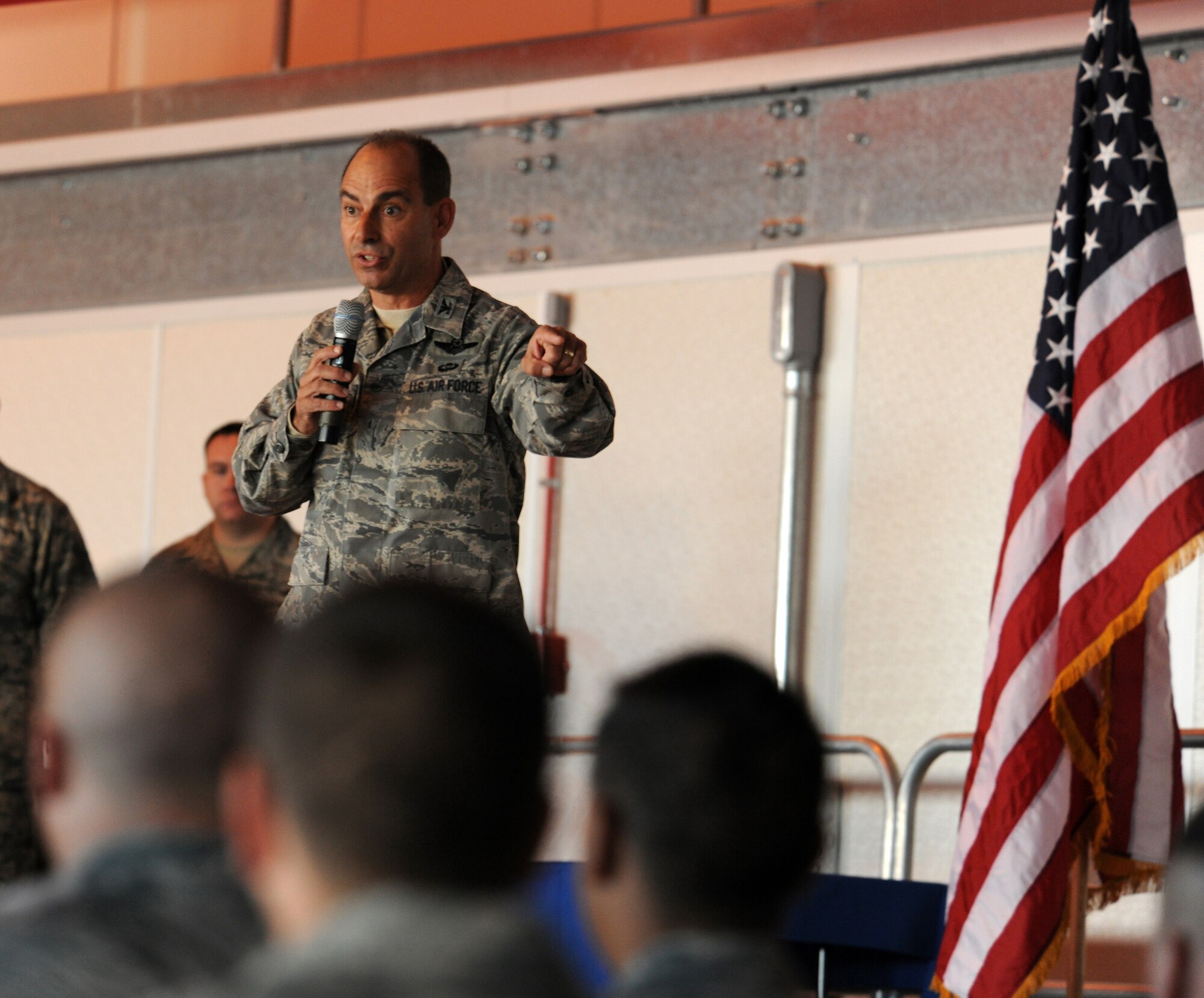 HOLLOMAN AIR FORCE BASE, N.M. -- Col. Jeff Harrigian, 49th Fighter Wing commander, speaks to Holloman's newest dedicated crew chiefs at a Dedicated Crew Chief Appointment ceremony here Dec. 4. The commander relayed his expectations to the 18 maintainers. He asked them to know their pilots, know their jet inside and out, be a professional everyday and mentor those below them. (U.S. Air Force photo by Senior Airman Michael Means)