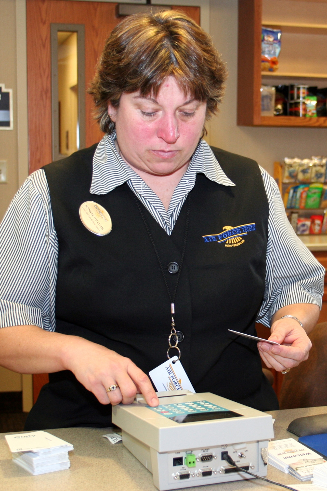 GRISSOM AIR RESERVE BASE, Ind., -- Grissom lodging guest services representative Jennifer Williams prepares room key cards for a unit training assembly weekend.  The Grissom guest services staff work diligently to ensure 434th Air Refueling Wing members have comfortable lodging when they report for duty at Grissom. (U.S. Air Force photo/Staff Sgt. Chris Bolen)