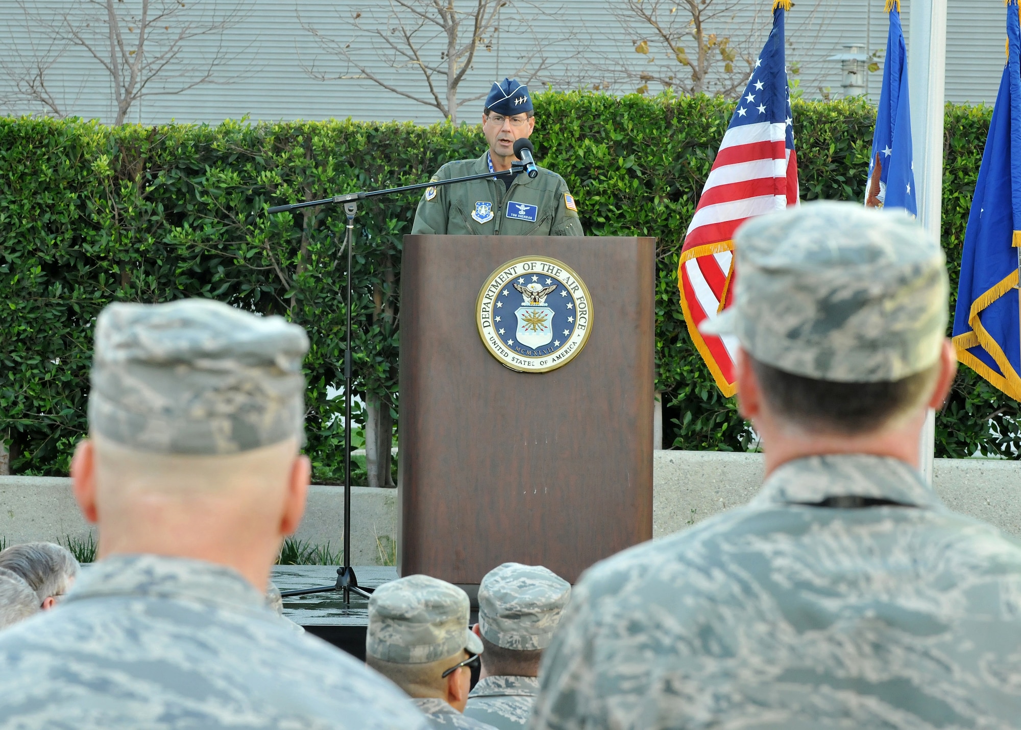 LT. Gen. Tom Sheridan, Space and Missile Systems Center commander, addresses military and civilian personnel during SMC Wingman Day All-Call held in the Schriever Space Complex courtyard, Dec. 1. “Wingman Day is a chance for us to strengthen the SMC ties,” said General Sheridan as he kicked off the day set aside for teambuilding, communication and interaction. (Photo by Atiba Copeland)