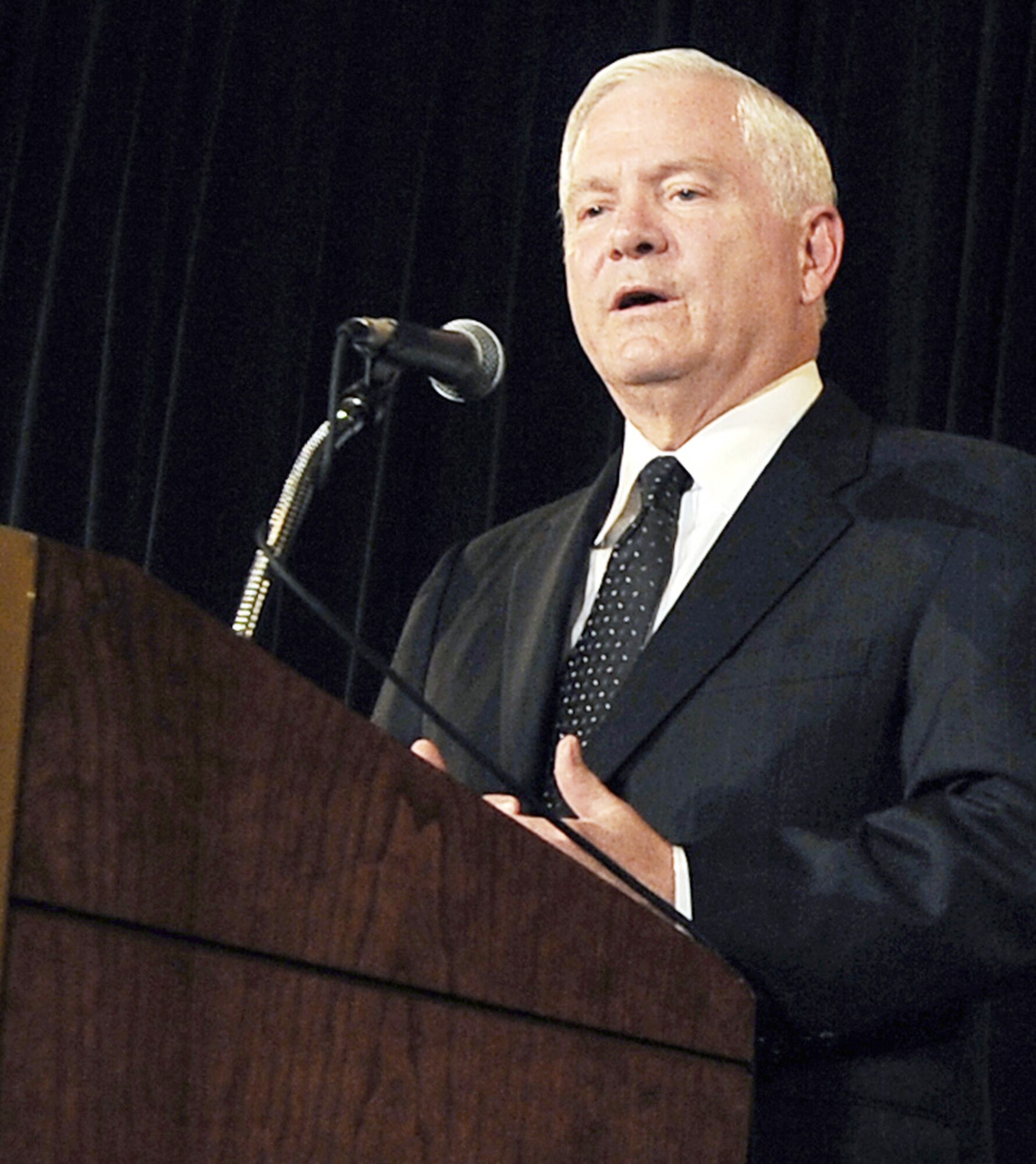 Defense Secretary Robert M. Gates speaks to members of the Economic Club of Chicago July 16, 2009, in Chicago. Secretary Gates and other top U.S. government and military officials appeared on three major networks Dec. 6, 2009, in Washington, to spell out President Barack Obama's new war strategy.  (DOD photo/Master Sgt. Jerry Morrison)
