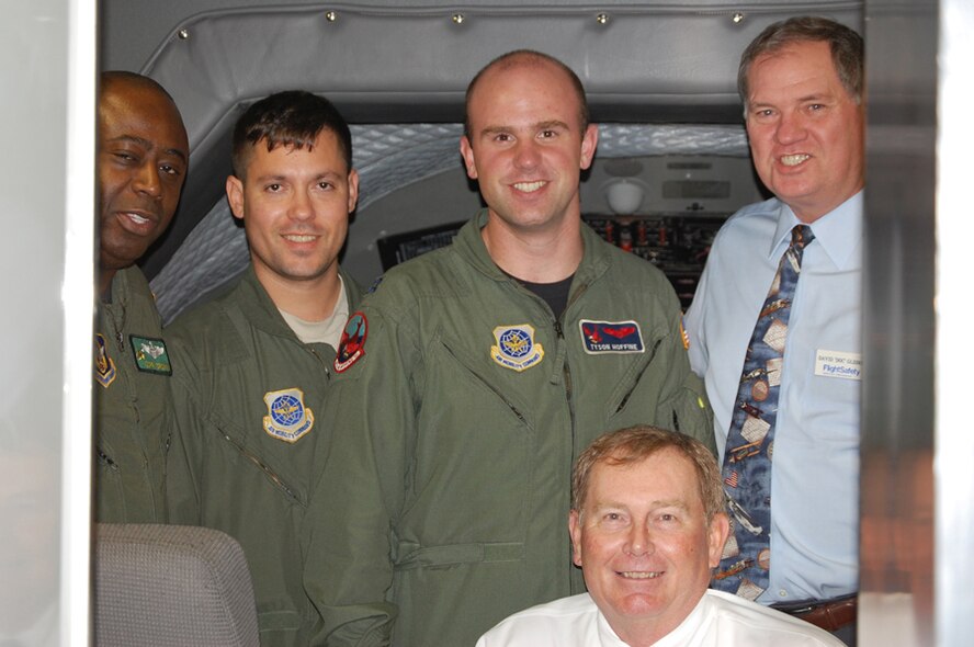 The first KC-135 training simulator block at the 916th Air Refueling Wing, Air Force Reserve was accomplished on Dec. 2, 2009.  From left to right:  Maj. Corey Brown, pilot, 1st Lt. David Vilela, co-pilot, Capt. Tyson Hoffine, aircraft commander, Mr. Tom Kiser, flight safety instructor and in the front, Mr. David "Doc" Glisson. (U.S. Air Force photo by: Ms. Donna Lea, 916ARW/PA)