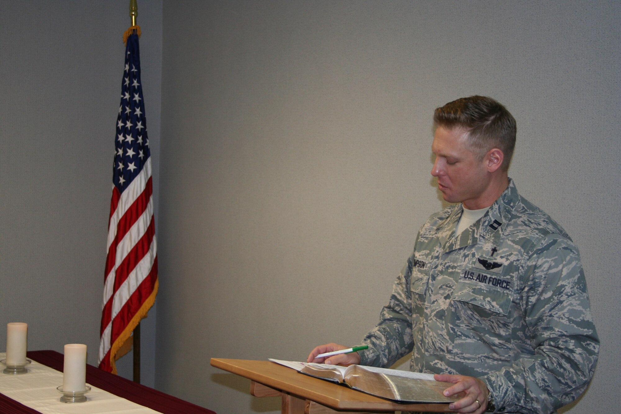 WRIGHT-PATTERSON AIR FORCE BASE, Ohio – Chaplain (Captain) Matthew Simpson, 445th Airlift Wing Chaplain’s office, delivers a message from the Bible while conducting the Second Advent service for wing members during the unit training assembly Dec. 6. Chaplains are available during both UTA’s. The 445th AW Chaplains office is located in Building 4010 room 149 or by phone 937-257-0589. (U.S. Air Force photo/Capt. Rod McNany)