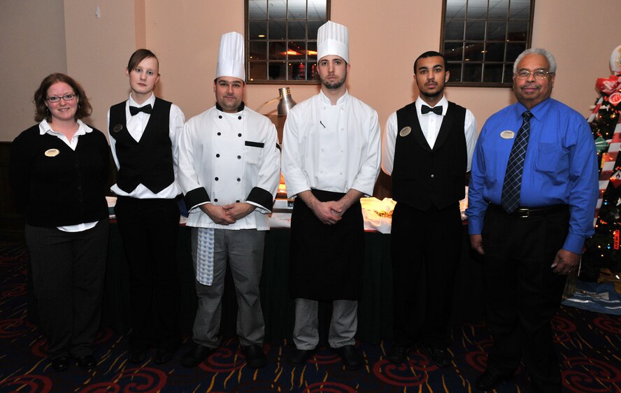 Col. Chad Manske, 100th Air Refueling Wing commander, thanked the Galaxy Club staff for their hard work on the annual Yuletide reception Dec. 4. (from left to right) Megan Russell, Galaxy Club Catering manager; Rebecca Dove, wait staff; Zane Kyte, cook; James Pangborn, cook; Ryan Scales, wait staff; and Andrew McCoy, Galaxy Club manager, were all thanked at the end of the evening.  (U.S. Air Force photo/Tech. Sgt. Kevin Wallace)